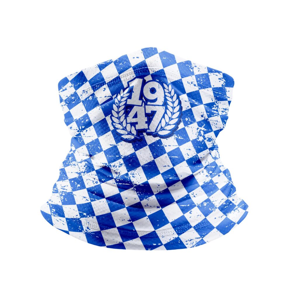 Komin polarny z niebiesko-białą szachownicą i emblematem z liczbą 1947 otoczony wieńcem laurowym.
